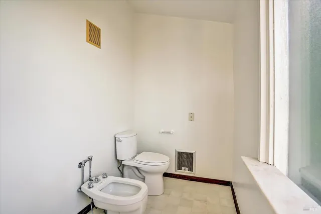 a bathroom with a sink and a shower curtain