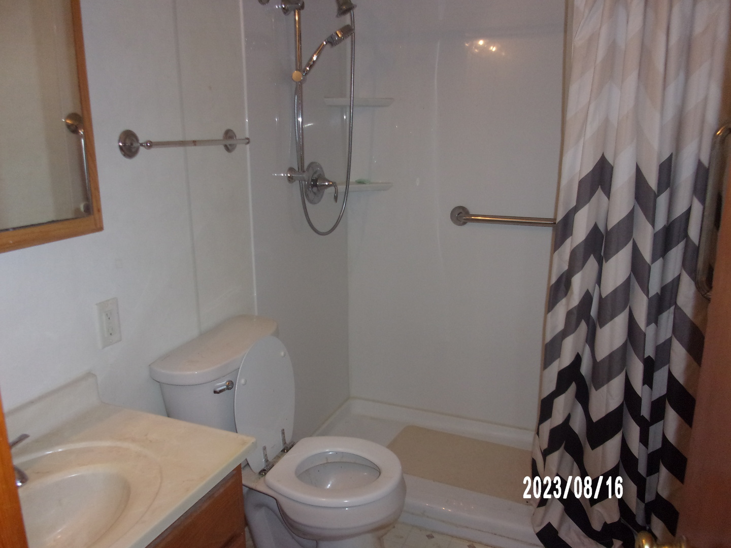 650 West Blue Street Sheldon, IL 60966 - Photo 8 of 12 a bathroom with a sink a toilet and shower