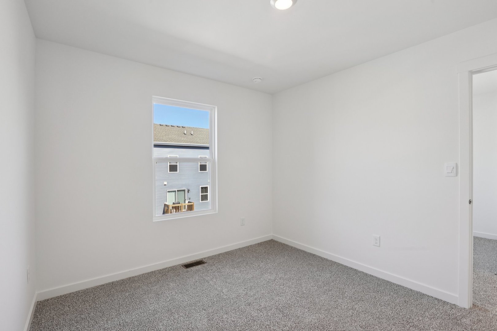 1403 Oakfield Lane Pingree Grove, IL 60140 - Photo 21 of 48 a view of an empty room and a window
