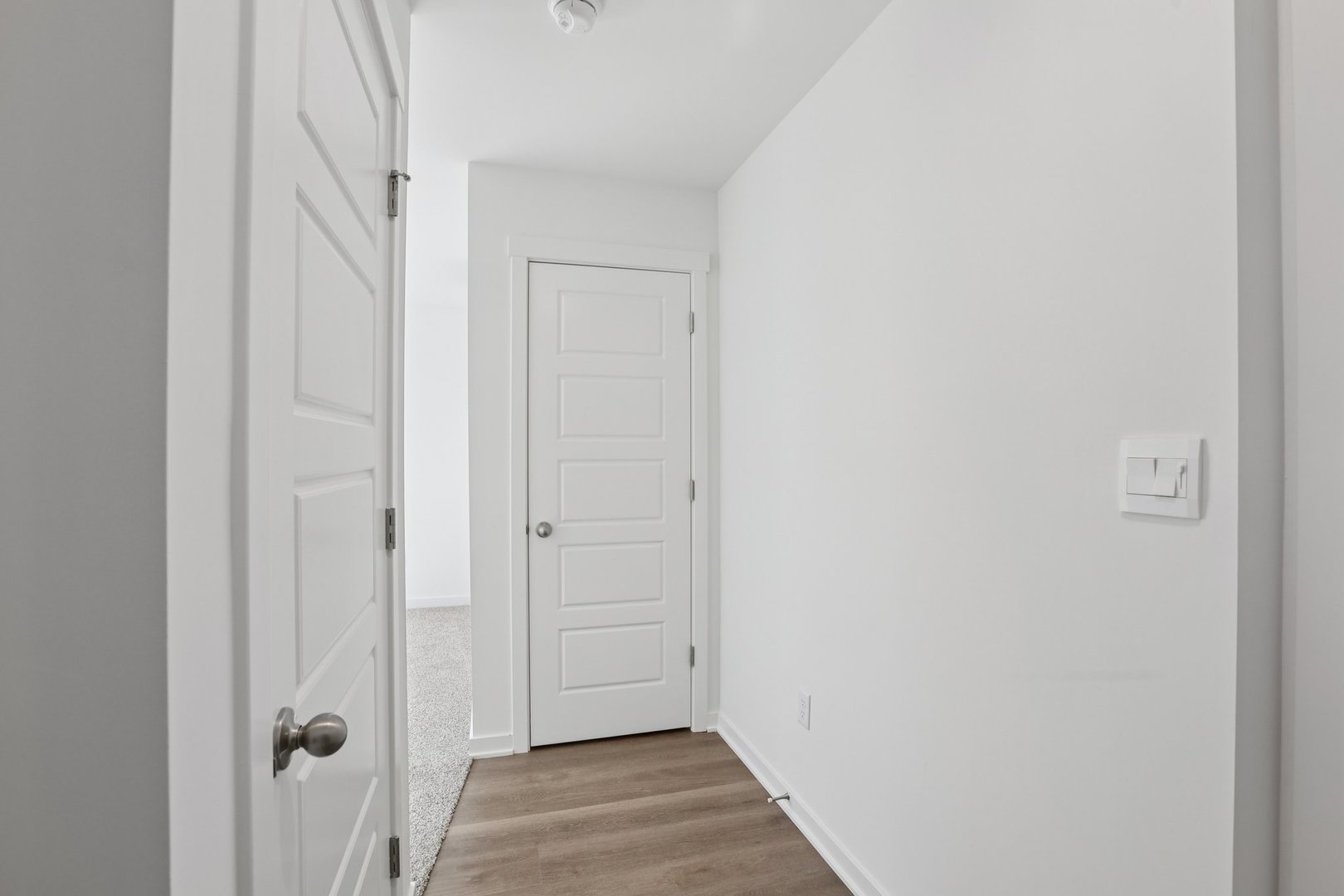 1403 Oakfield Lane Pingree Grove, IL 60140 - Photo 28 of 48 a view of a hallway with wooden floor