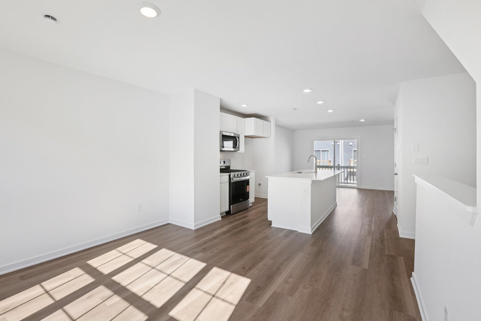1403 Oakfield Lane Pingree Grove, IL 60140 - Photo 6 of 48 a view of kitchen and hall with wooden floor