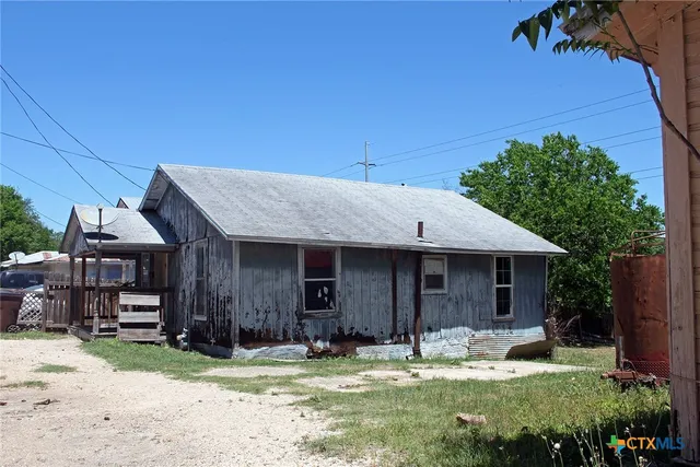 a house with garden in front of it