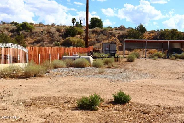 a view of a barn with a yard