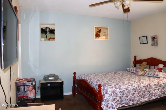 a bathroom with a sink toilet and mirror