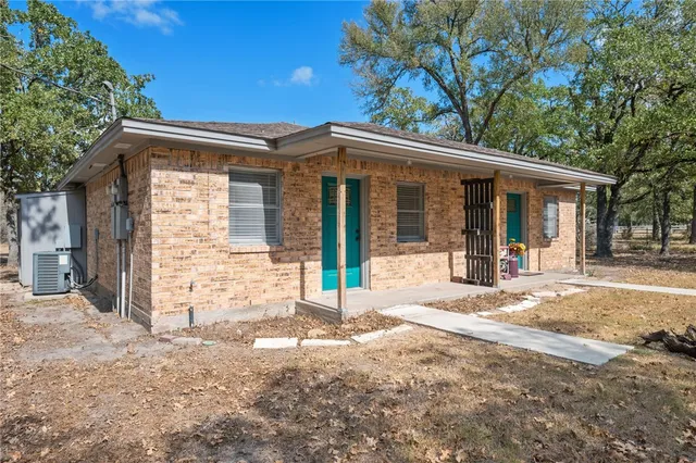 a view of a house with a patio