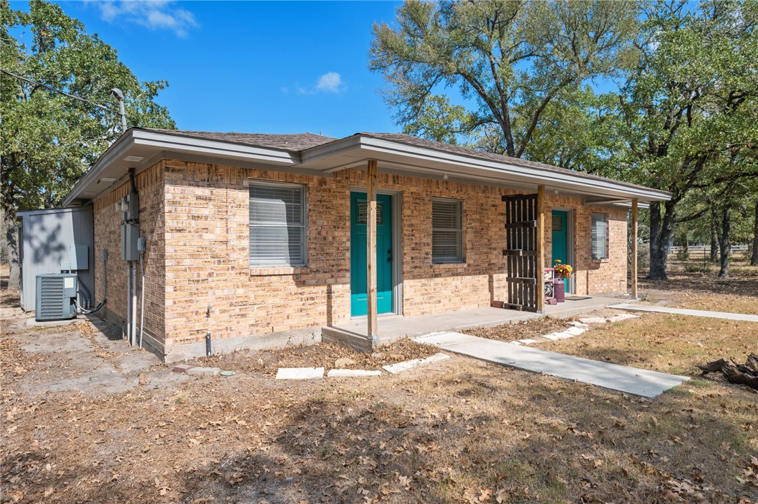 a view of a house with a patio