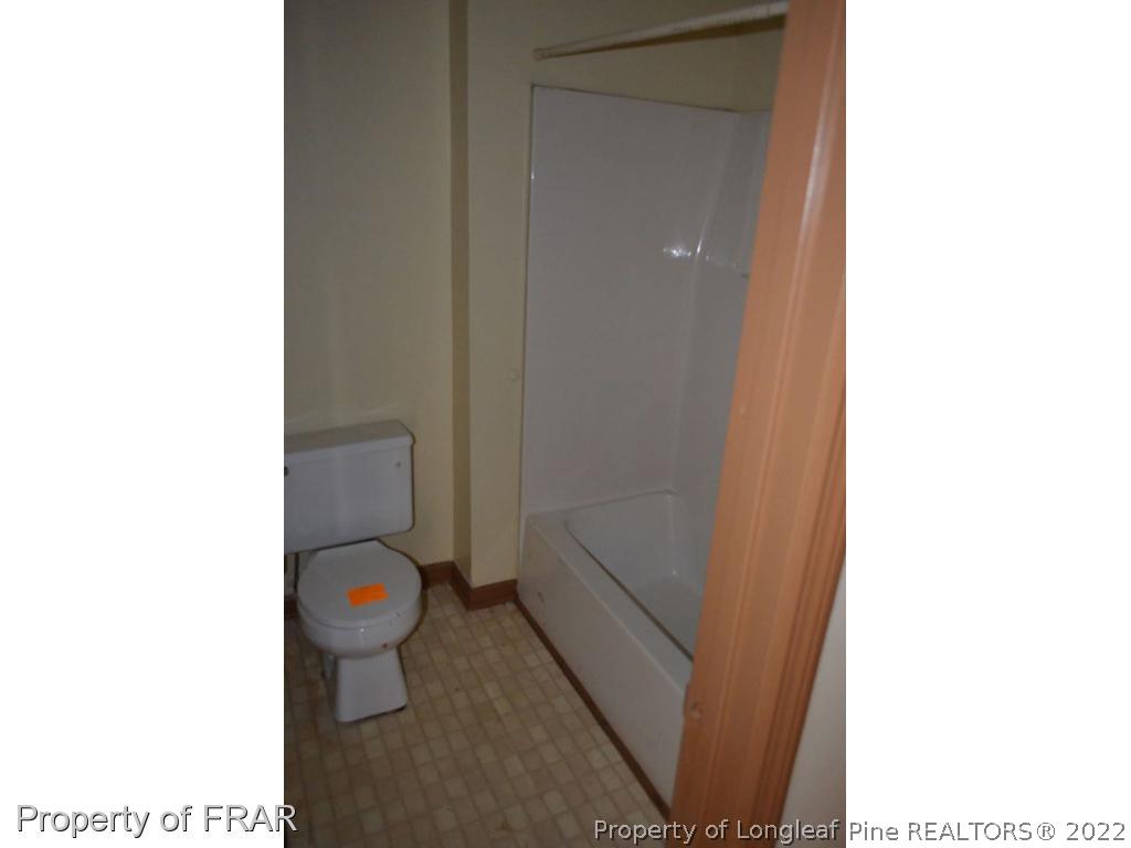 110 Bruce Lane Spring Lake, NC 28390 - Photo 12 of 21 a bathroom with a toilet and a sink