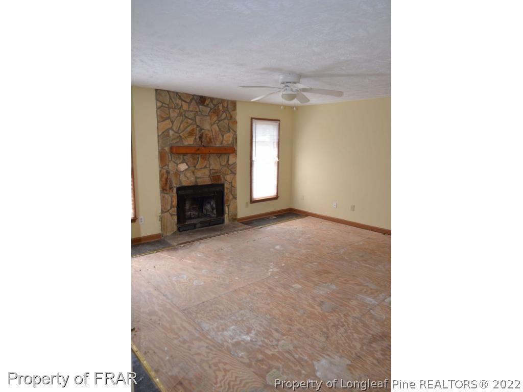 110 Bruce Lane Spring Lake, NC 28390 - Photo 20 of 21 a view of a livingroom with a fireplace