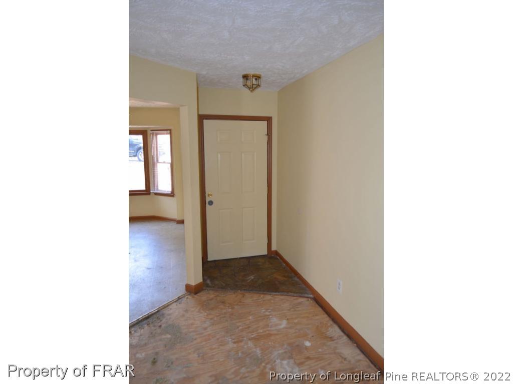 110 Bruce Lane Spring Lake, NC 28390 - Photo 6 of 21 a view of a room with a hallway