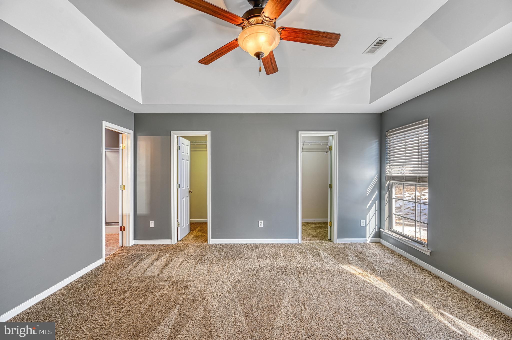 343 Cardinal Road Louisa, VA 23093 - Photo 20 of 48 a view of a room with a ceiling fan and window