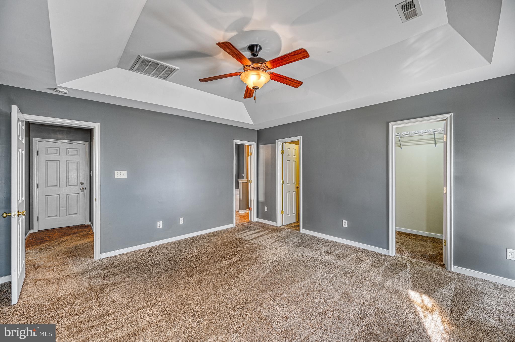 343 Cardinal Road Louisa, VA 23093 - Photo 22 of 48 a view of a livingroom with a ceiling fan and window