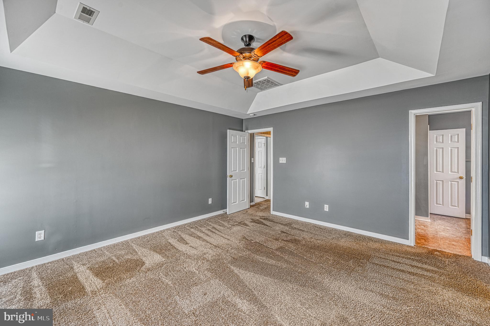 343 Cardinal Road Louisa, VA 23093 - Photo 25 of 48 a view of an empty room with a ceiling fan