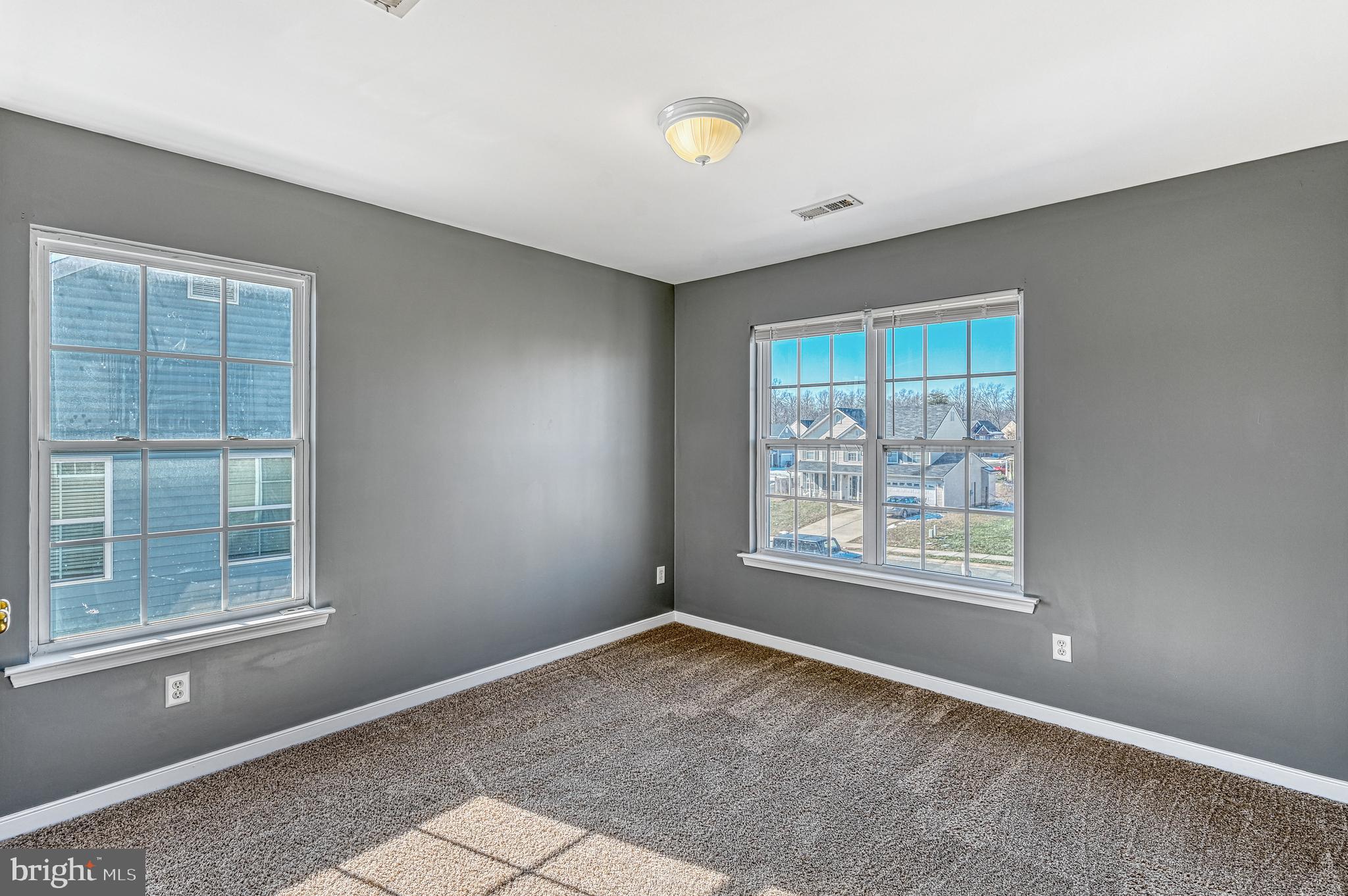 343 Cardinal Road Louisa, VA 23093 - Photo 34 of 48 an empty room with windows and closet