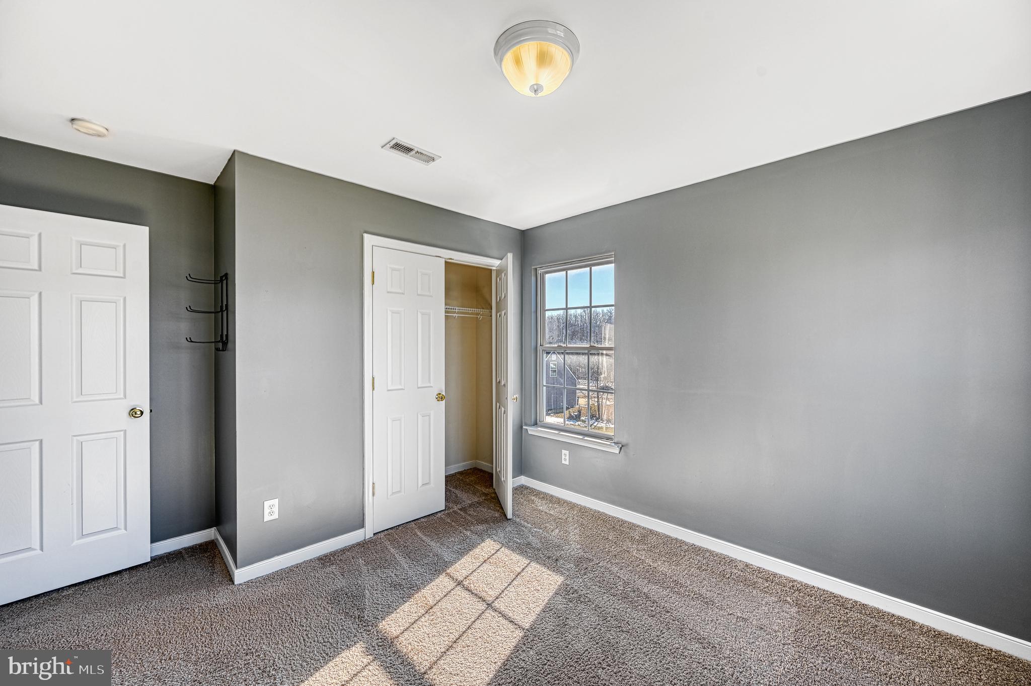 343 Cardinal Road Louisa, VA 23093 - Photo 37 of 48 an empty room with windows