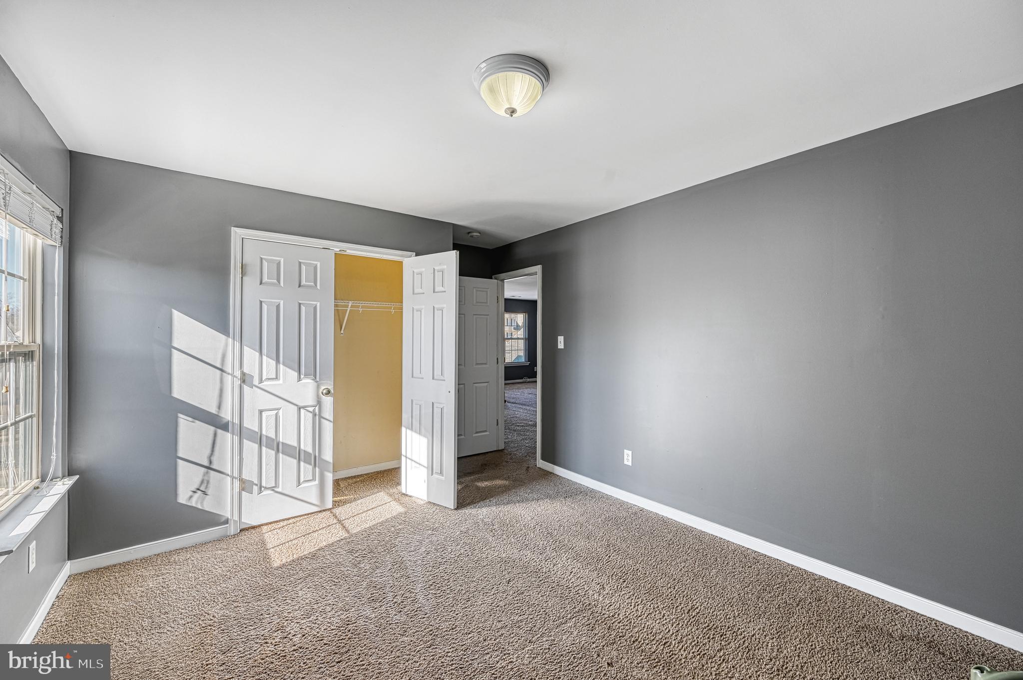 343 Cardinal Road Louisa, VA 23093 - Photo 38 of 48 an empty room with windows and closet