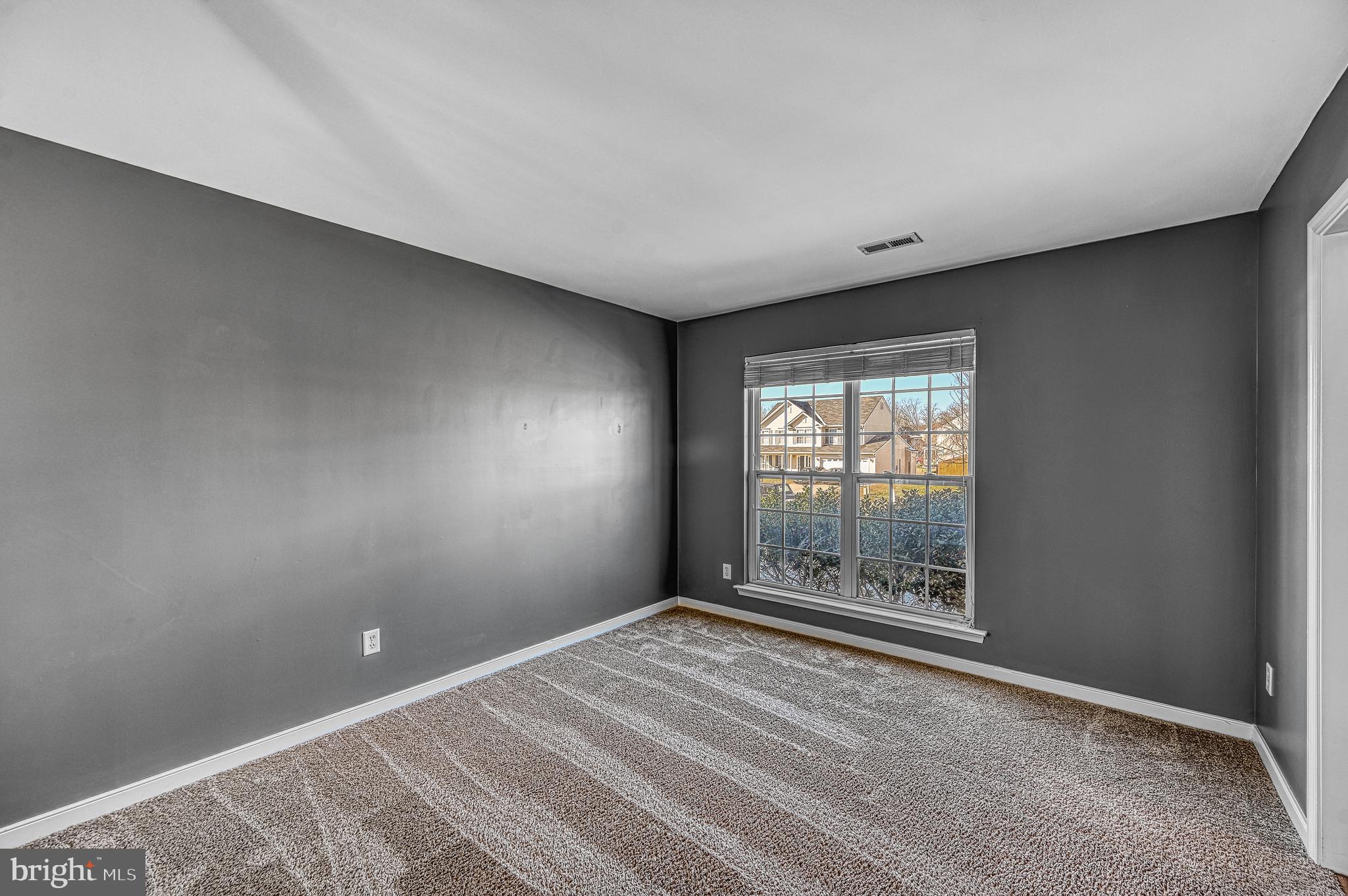 343 Cardinal Road Louisa, VA 23093 - Photo 9 of 48 an empty room with windows
