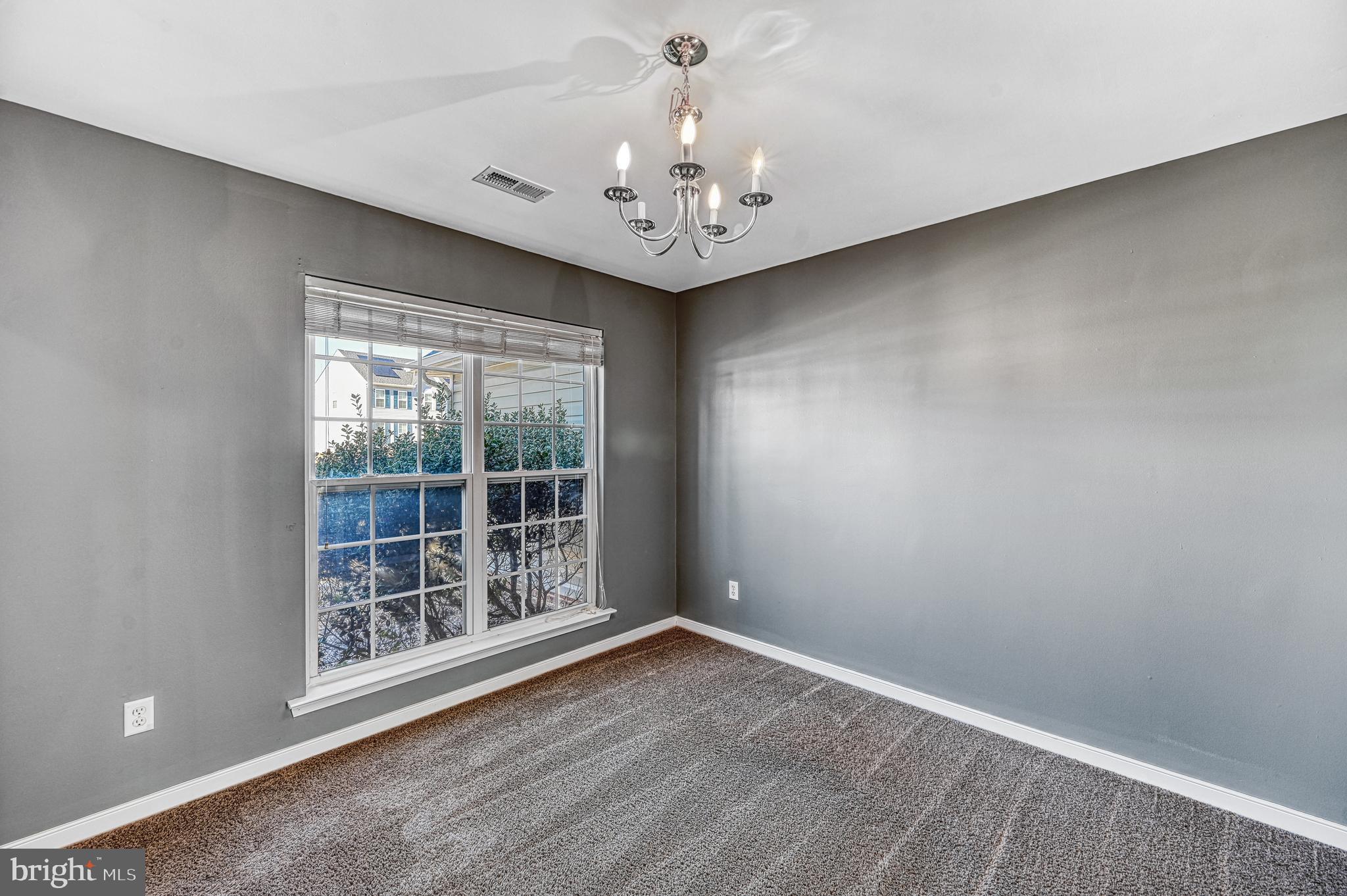 343 Cardinal Road Louisa, VA 23093 - Photo 10 of 48 a view of an empty room with a window