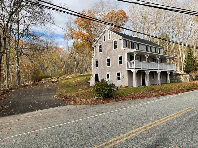 a view of a building with a street