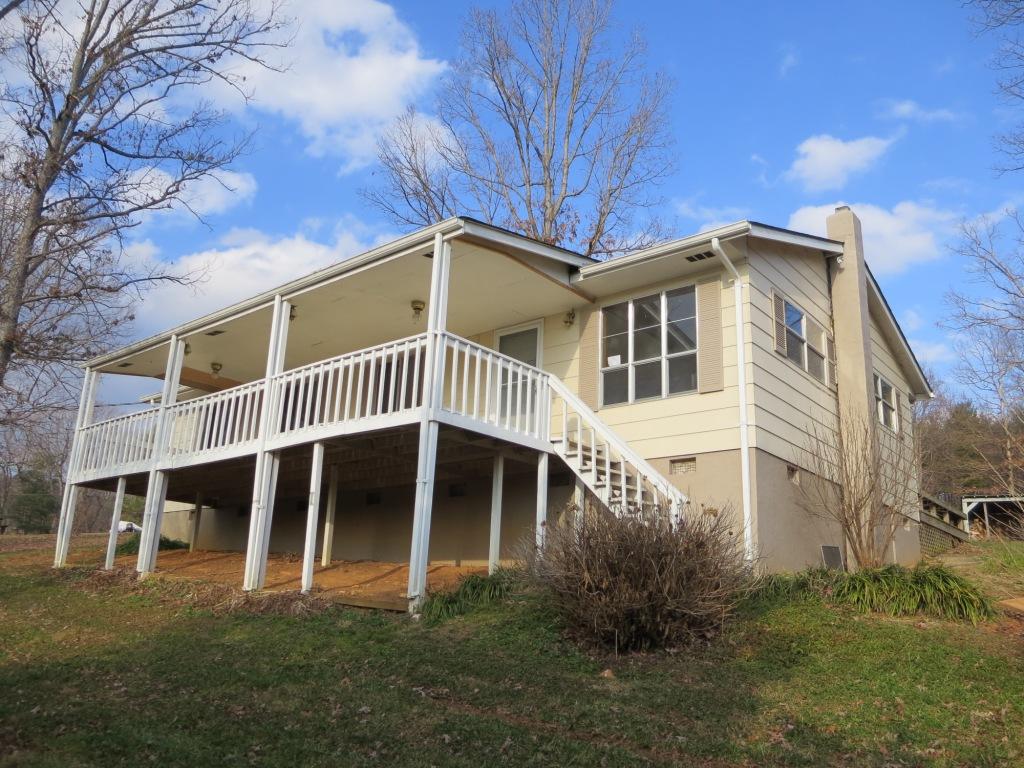 4171 6 Mile Post Road Rocky Mount, VA 24151 - Photo 1 of 10 a front view of a house with a yard
