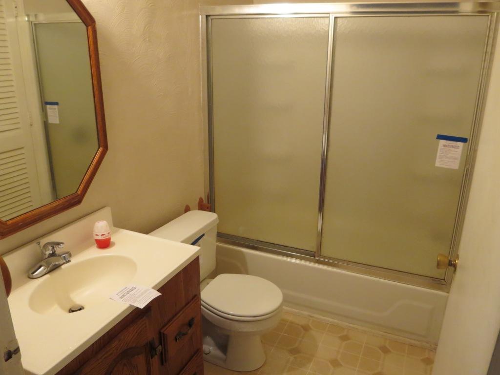 4171 6 Mile Post Road Rocky Mount, VA 24151 - Photo 5 of 10 a bathroom with a sink toilet and shower