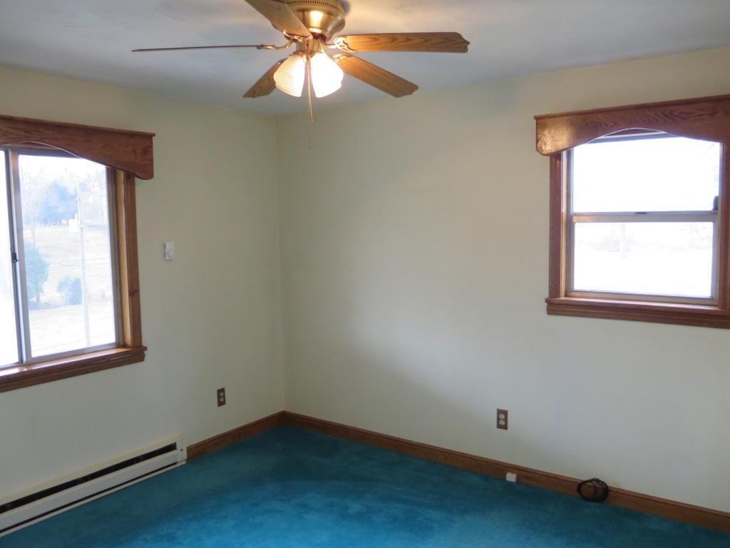 4171 6 Mile Post Road Rocky Mount, VA 24151 - Photo 7 of 10 an empty room with a window