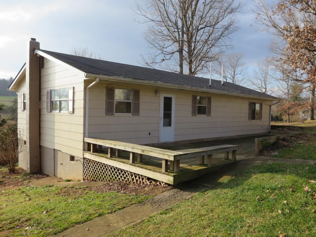 4171 6 Mile Post Road Rocky Mount, VA 24151 - Photo 10 of 10 a front view of a house with a yard