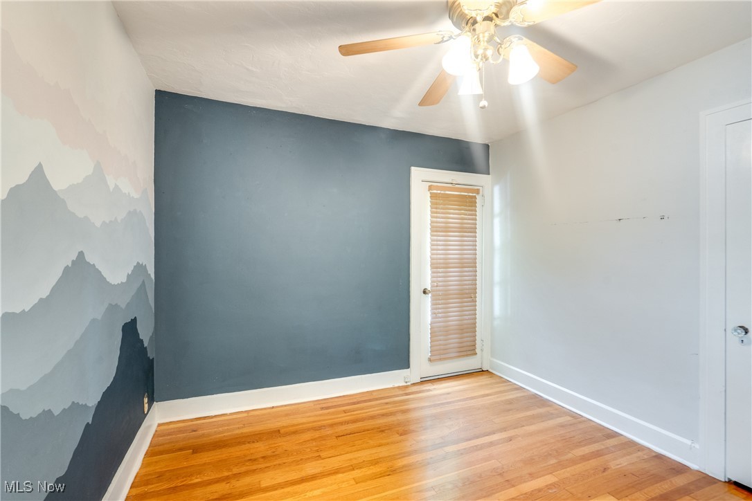 3130 Corydon Road Cleveland, OH 44118 - Photo 28 of 44 Empty room with ceiling fan and light wood-type flooring