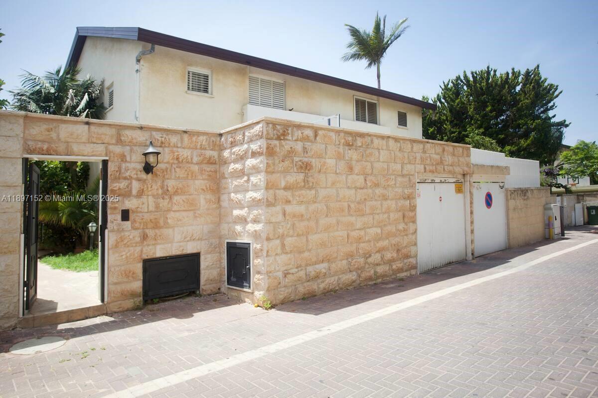 a front view of a house with a garage