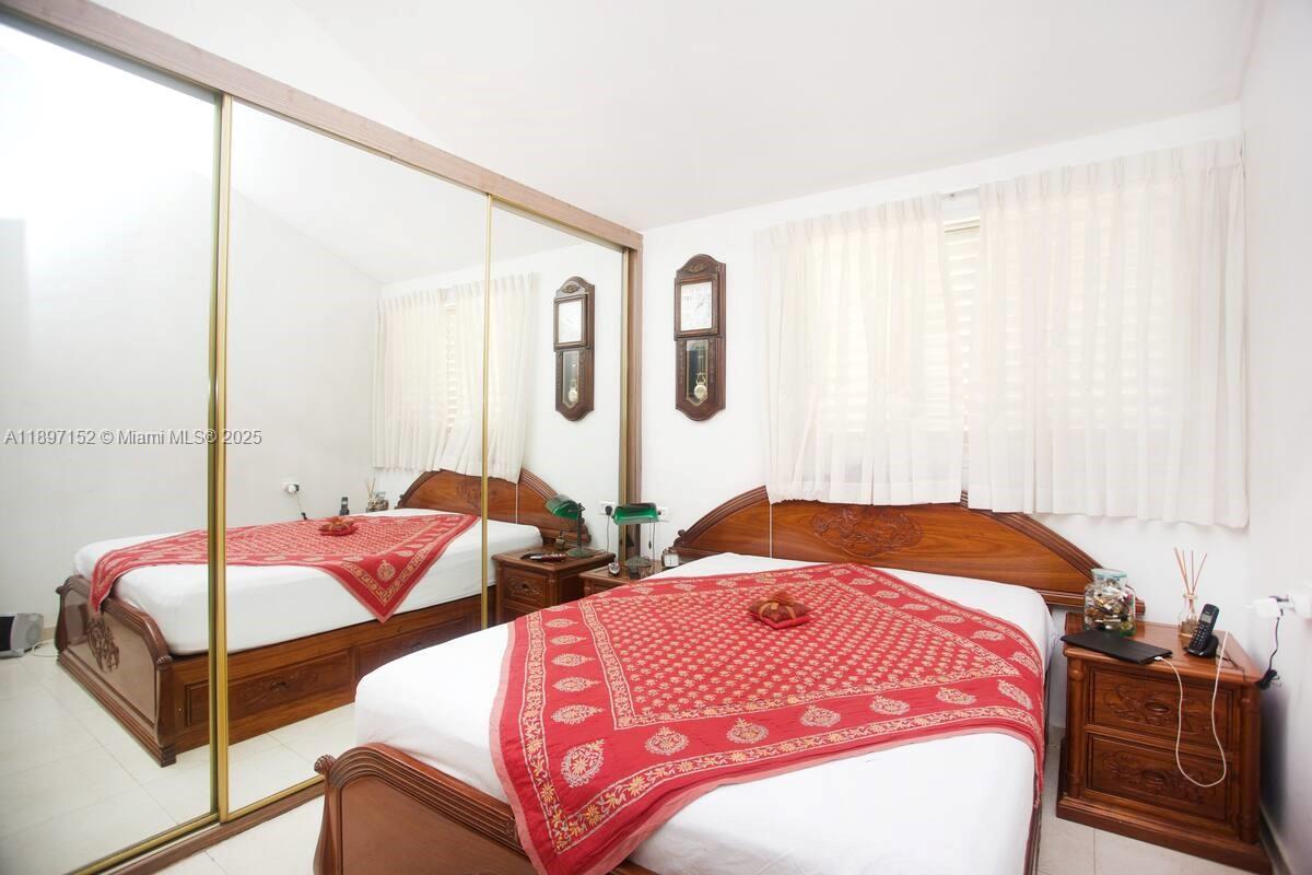 10 Hapiyyus Fort Wayne, IL 46814 - Photo 13 of 31 a bedroom with two beds and next to a window