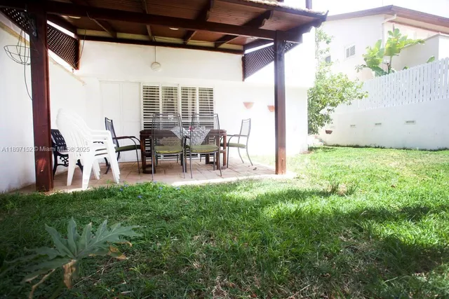 a picture of a house with a yard