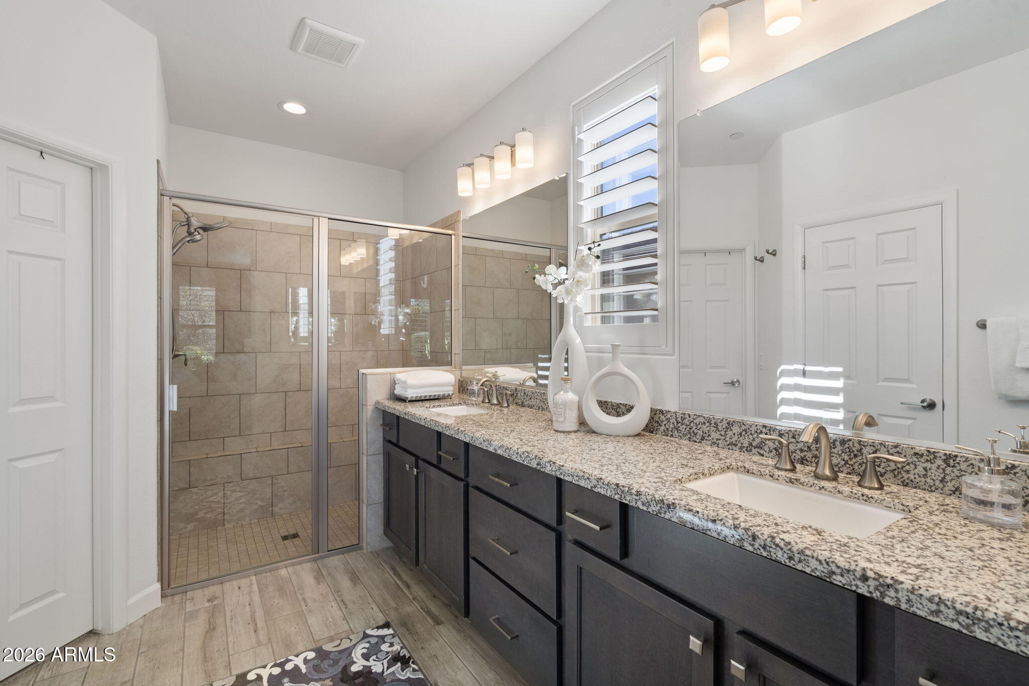 17521 East Silver Sage Lane Rio Verde, AZ 85263 - Photo 12 of 27 a bathroom with a granite countertop sink and a mirror