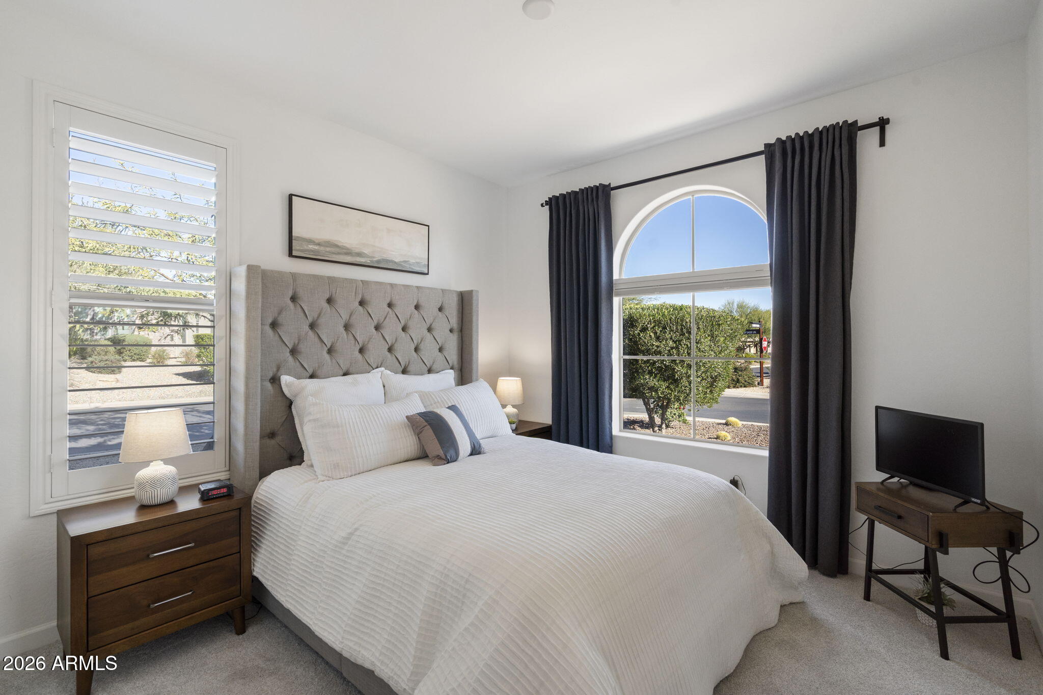 17521 East Silver Sage Lane Rio Verde, AZ 85263 - Photo 13 of 27 a bedroom with a bed and a large window