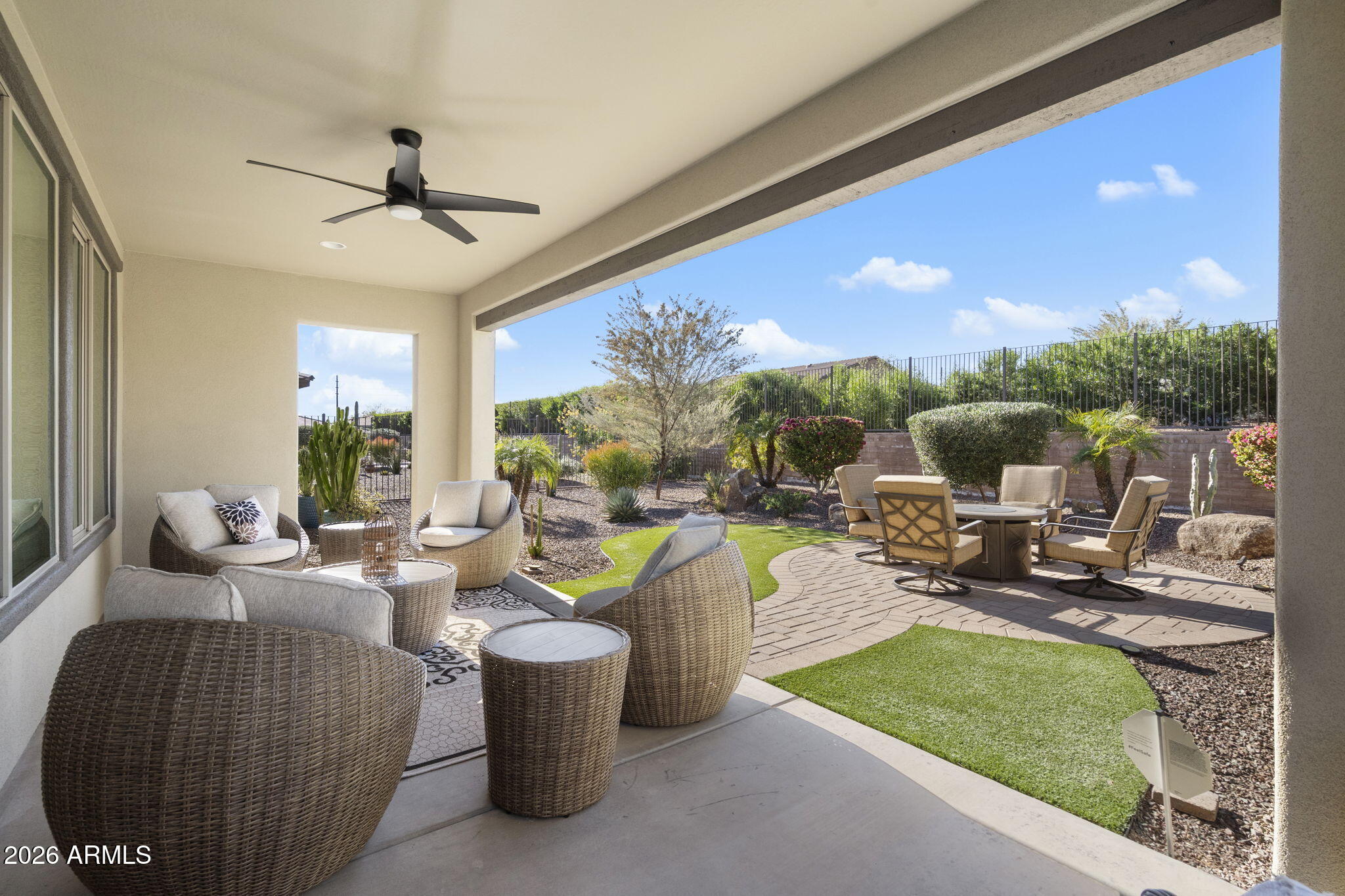 17521 East Silver Sage Lane Rio Verde, AZ 85263 - Photo 16 of 27 a living room with furniture and a large window