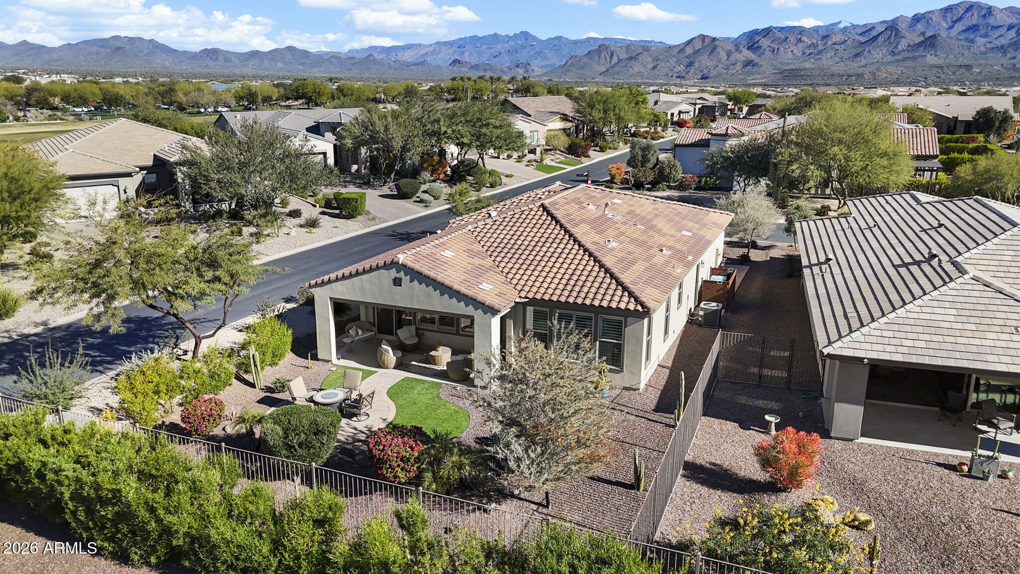 17521 East Silver Sage Lane Rio Verde, AZ 85263 - Photo 20 of 27 an aerial view of a house with a garden and mountain view in back