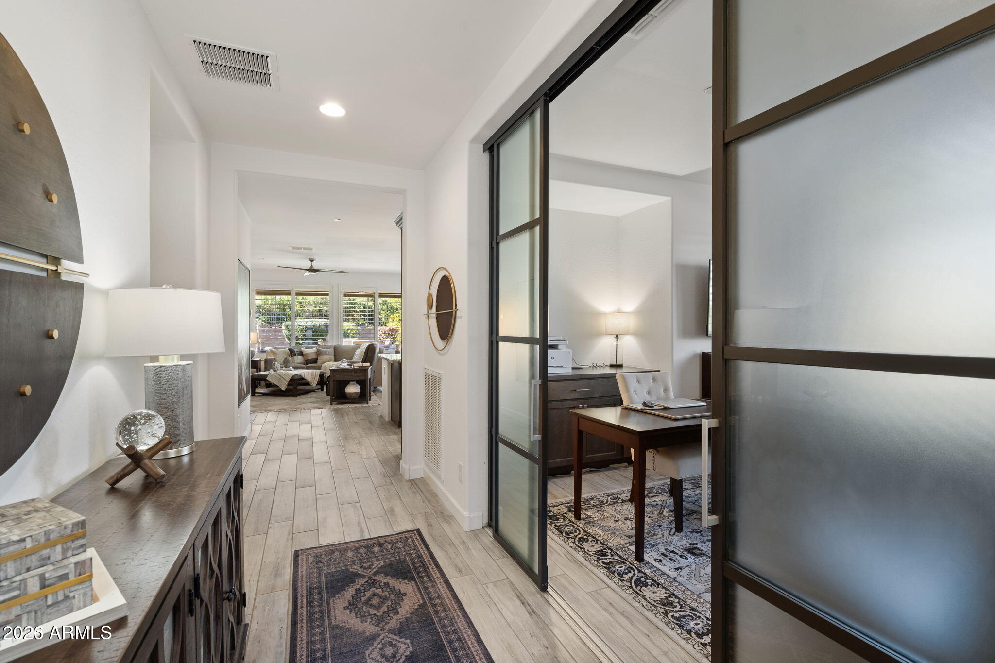 17521 East Silver Sage Lane Rio Verde, AZ 85263 - Photo 5 of 27 a view of a living room and dining room