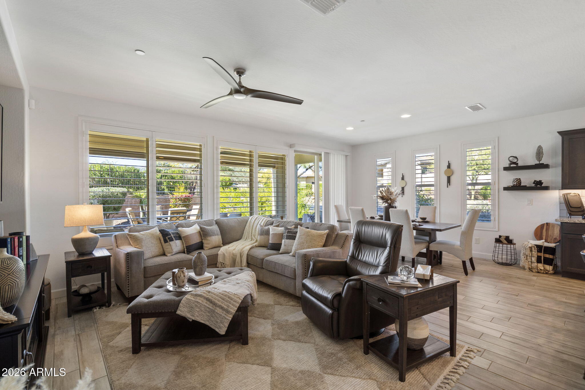17521 East Silver Sage Lane Rio Verde, AZ 85263 - Photo 6 of 27 a living room with furniture and a large window