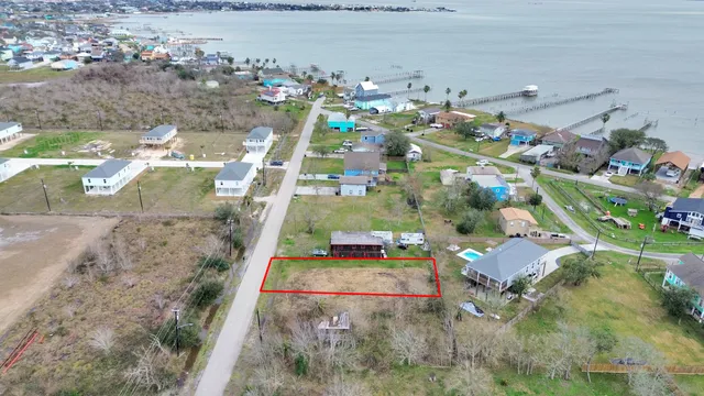 a view of swimming pool with a yard