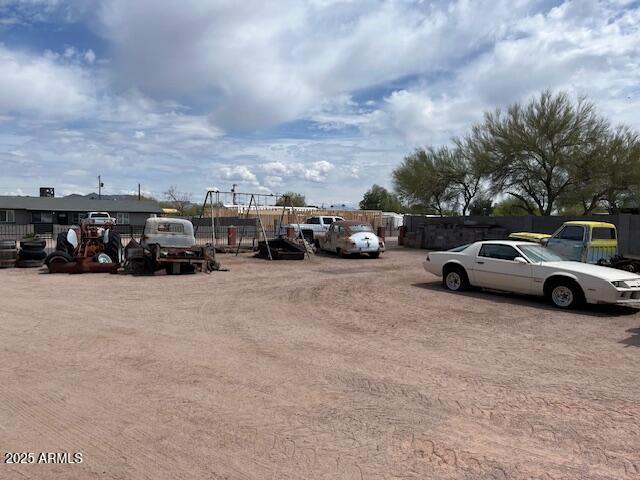 a view of street with parked cars