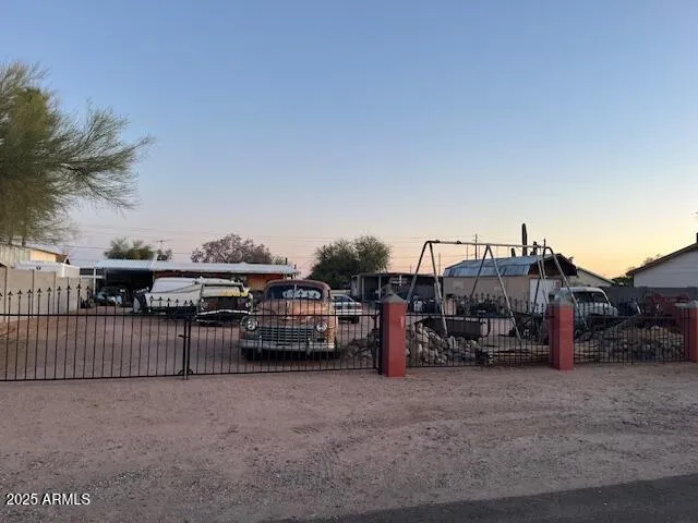 a view of a car park in front of house