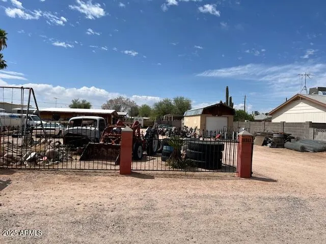 a view of a house with a snow in the background