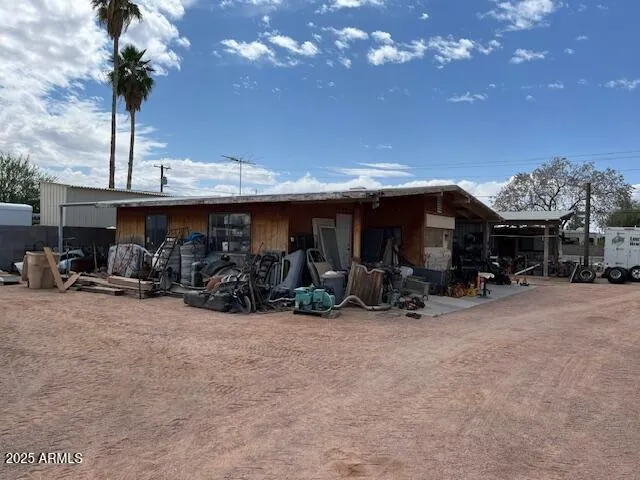 a view of a chairs and tables in patio