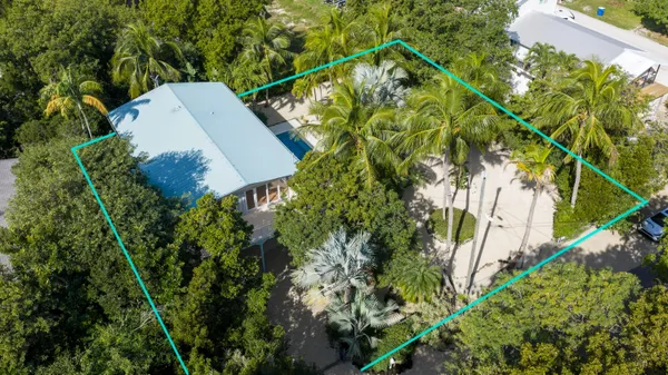 a view of a house with a swimming pool