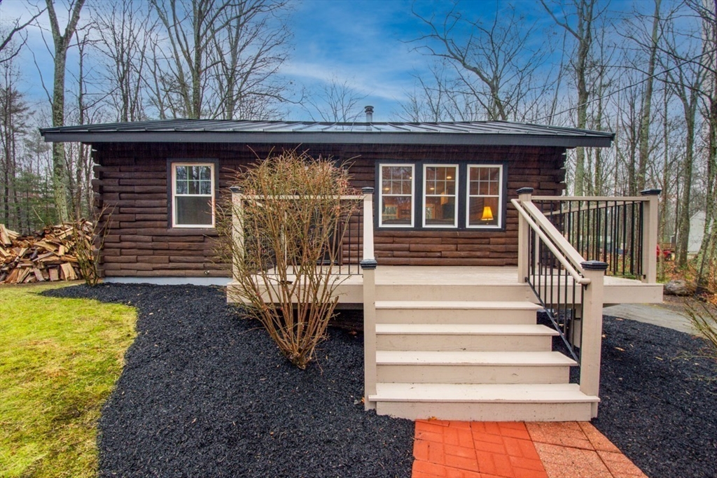 100 Dunn Road Ashburnham, MA 01430 - Photo 2 of 31 a front view of a house with a yard