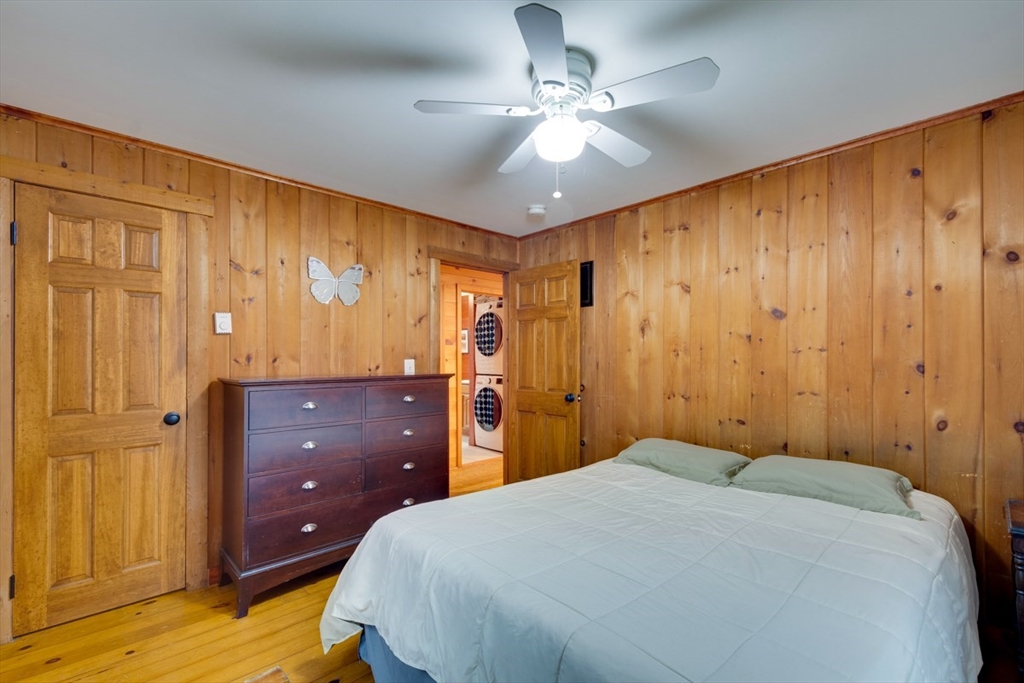 100 Dunn Road Ashburnham, MA 01430 - Photo 25 of 31 a bedroom with a bed and a dresser