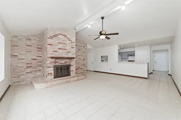 a view of a livingroom with a fireplace