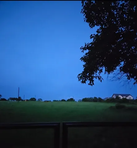 a view of a lake with sunset view