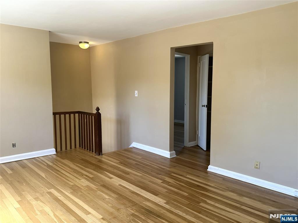 460 Heath Place, Unit 48 Hackensack, NJ 07601 - Photo 3 of 10 a view of a room with wooden floor