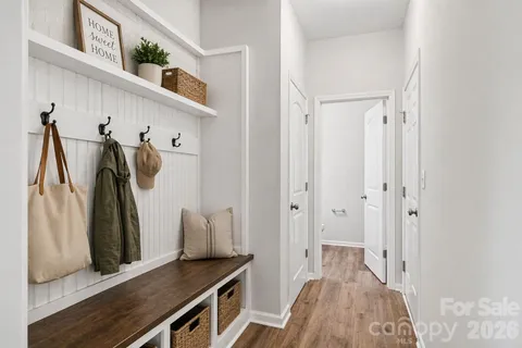 a bathroom with a granite countertop sink a mirror and a