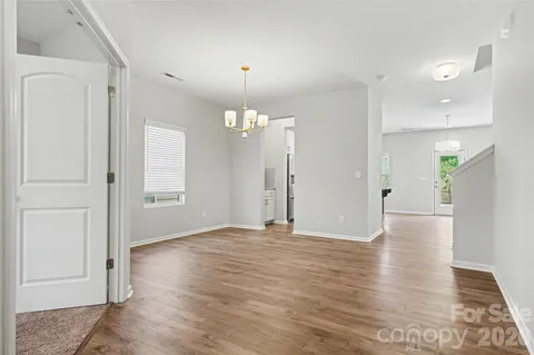 a view of a livingroom with wooden floor