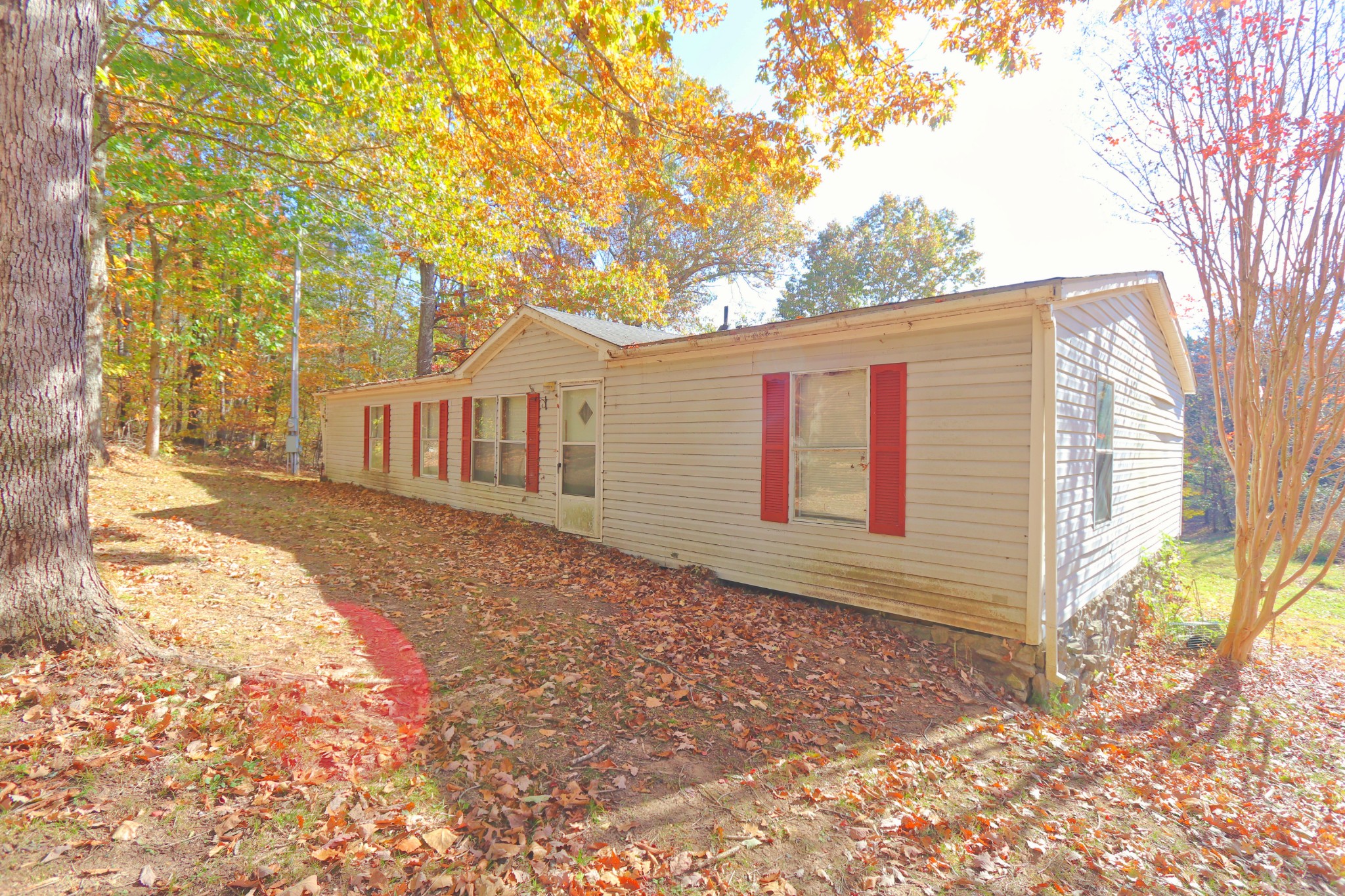 2051 Canoe Branch Road Lebanon, TN 37087 - Photo 13 of 18 a backyard of a house with large trees and barbeque oven